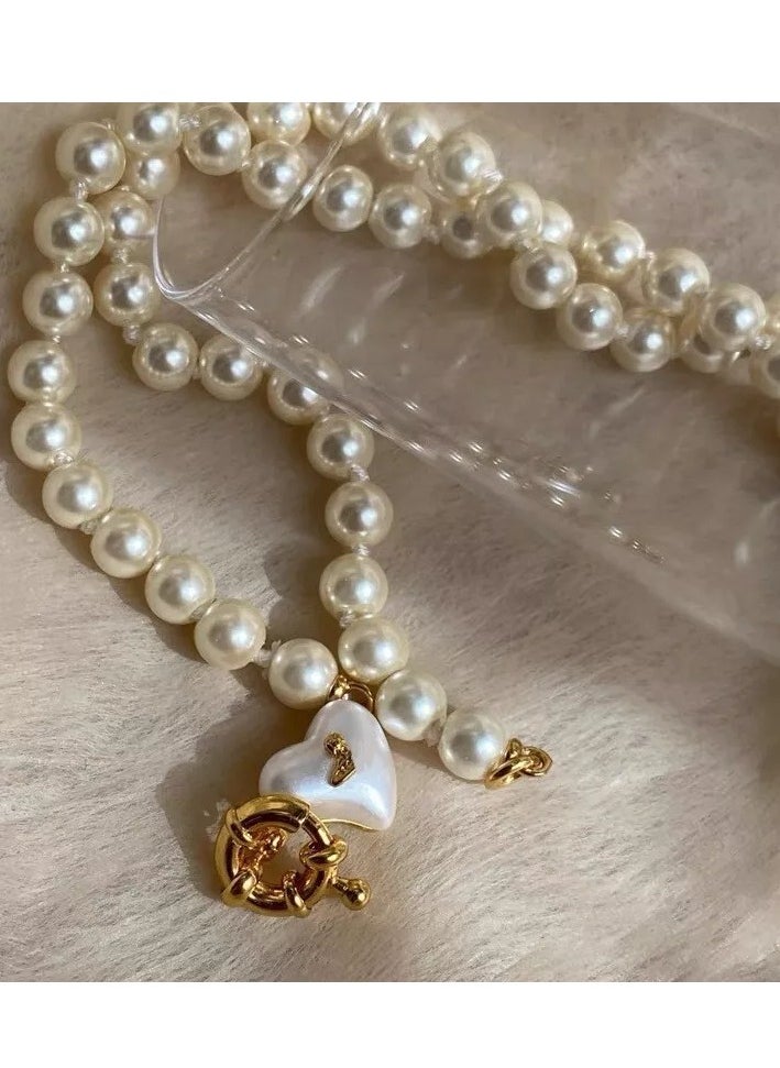 Vivienne Westwood - Gold Mini Heart Shape White Pearl Necklace - Image 1