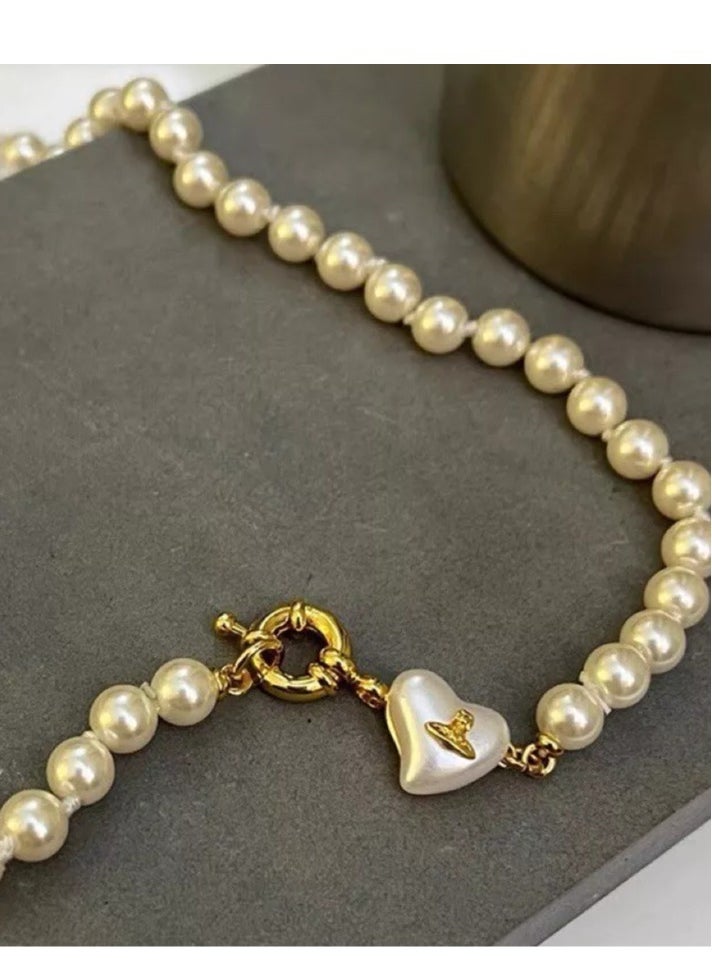 Vivienne Westwood - Gold Mini Heart Shape White Pearl Necklace - Image 1