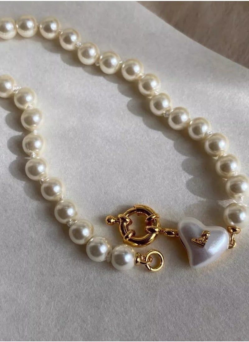 Vivienne Westwood - Gold Mini Heart Shape White Pearl Necklace - Image 1