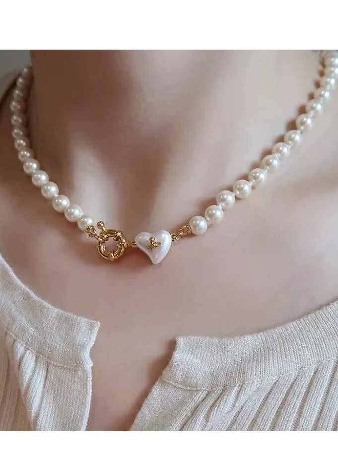 Vivienne Westwood - Gold Mini Heart Shape White Pearl Necklace - Image 1