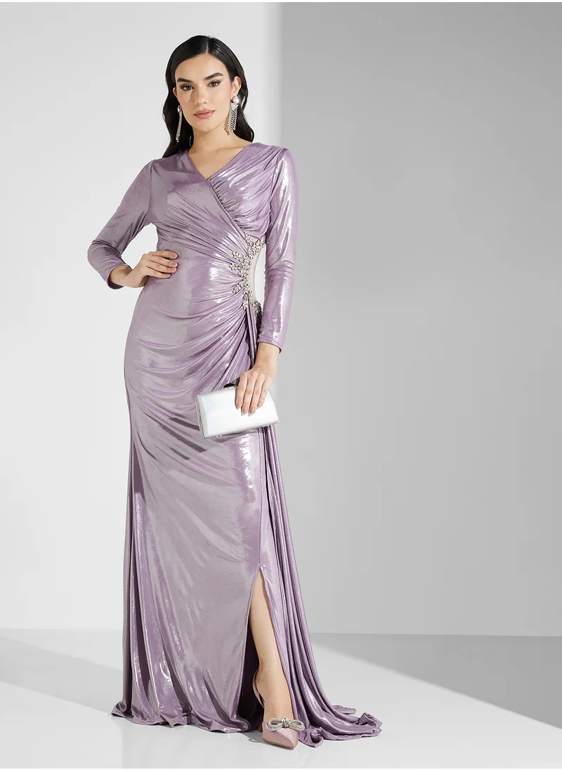 نمشي x Draped Metallic Wrap Dress With Diamante Detail