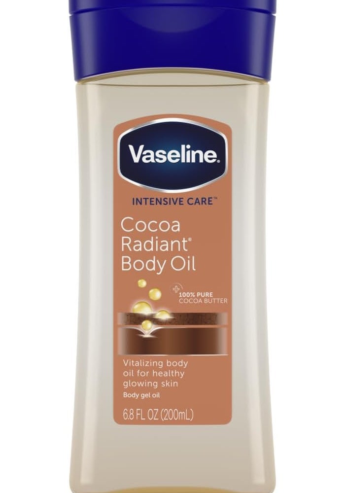 فازلين زيت الجسم المنشط والمشرق بخلاصة الكاكاو للعناية المركزة، غني بزبدة الكاكاو النقية 100% وزيوت مغذية لإشراقة تدوم طويلاً | جل زيتي غير دهني للجسم لبشرة صحية ومتألقة | 200 مل - Image 1