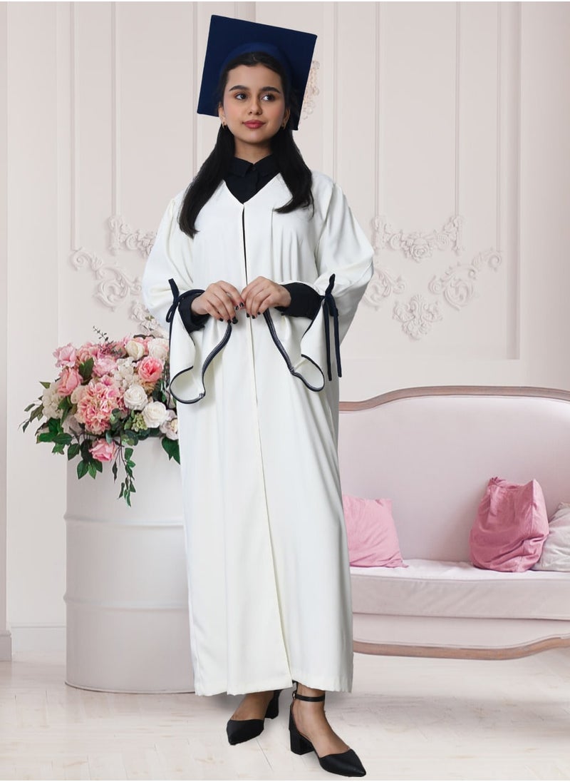 HAWRAA ABAYA - Graduation uniform: white abaya with wide open sleeves, decorated with a bow, with a plain scarf and cap, in dark navy blue - Image 1