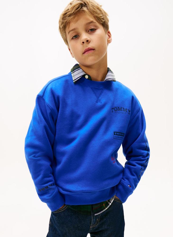 تومي هيلفيغر سويت شيرت بياقة دائرية بطبعات متعددة للشباب - Image 1