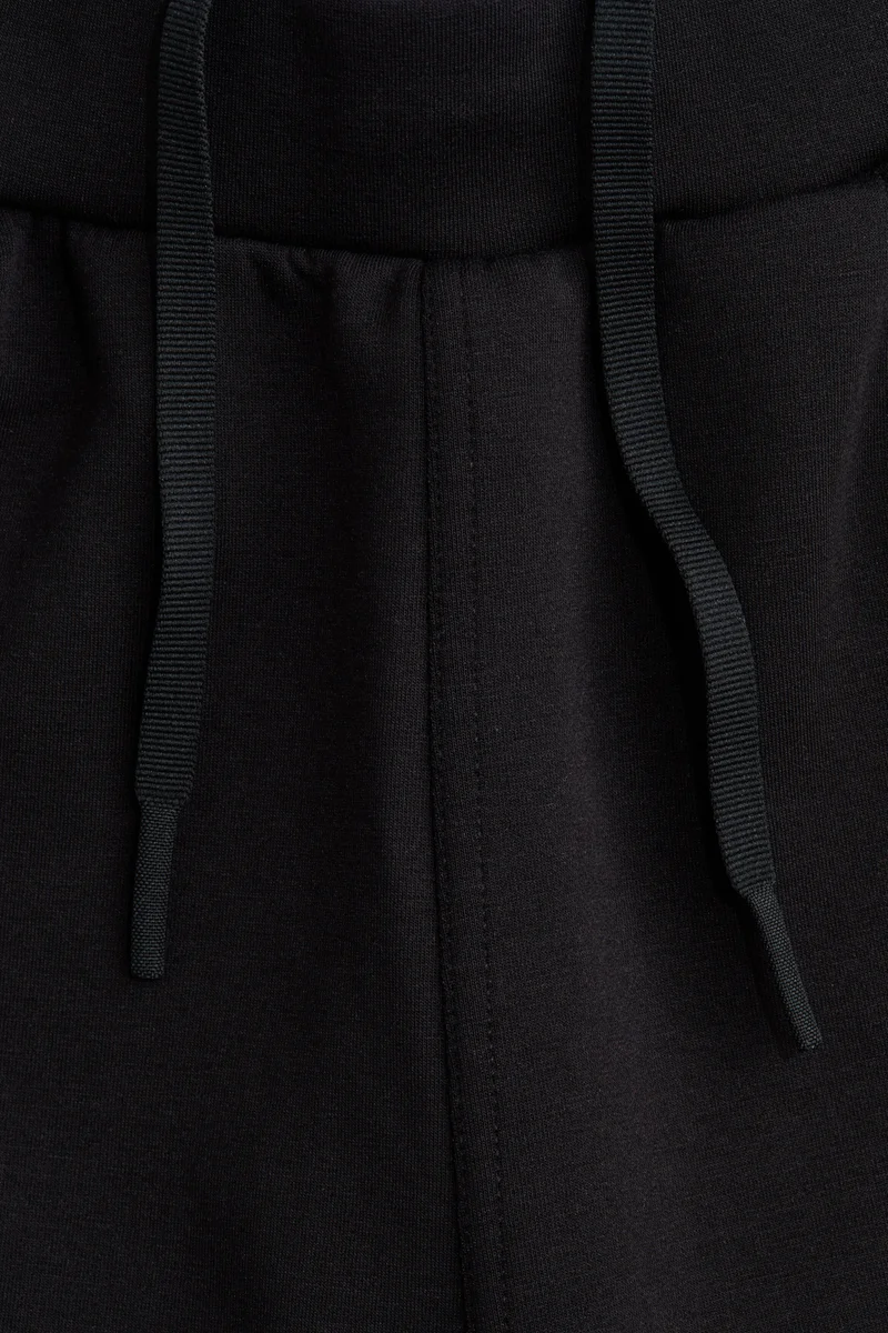 H&M  Regular Fit Tapered sports joggers with DryMove™ for Men | Best Price UAE