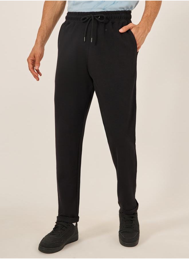 Styli - Slim Fit Pique Knit Pants with Turn-Up Hem - Image 1