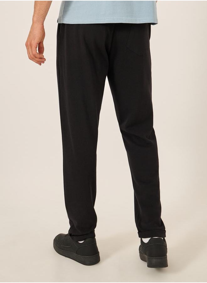 Styli - Slim Fit Pique Knit Pants with Turn-Up Hem - Image 1