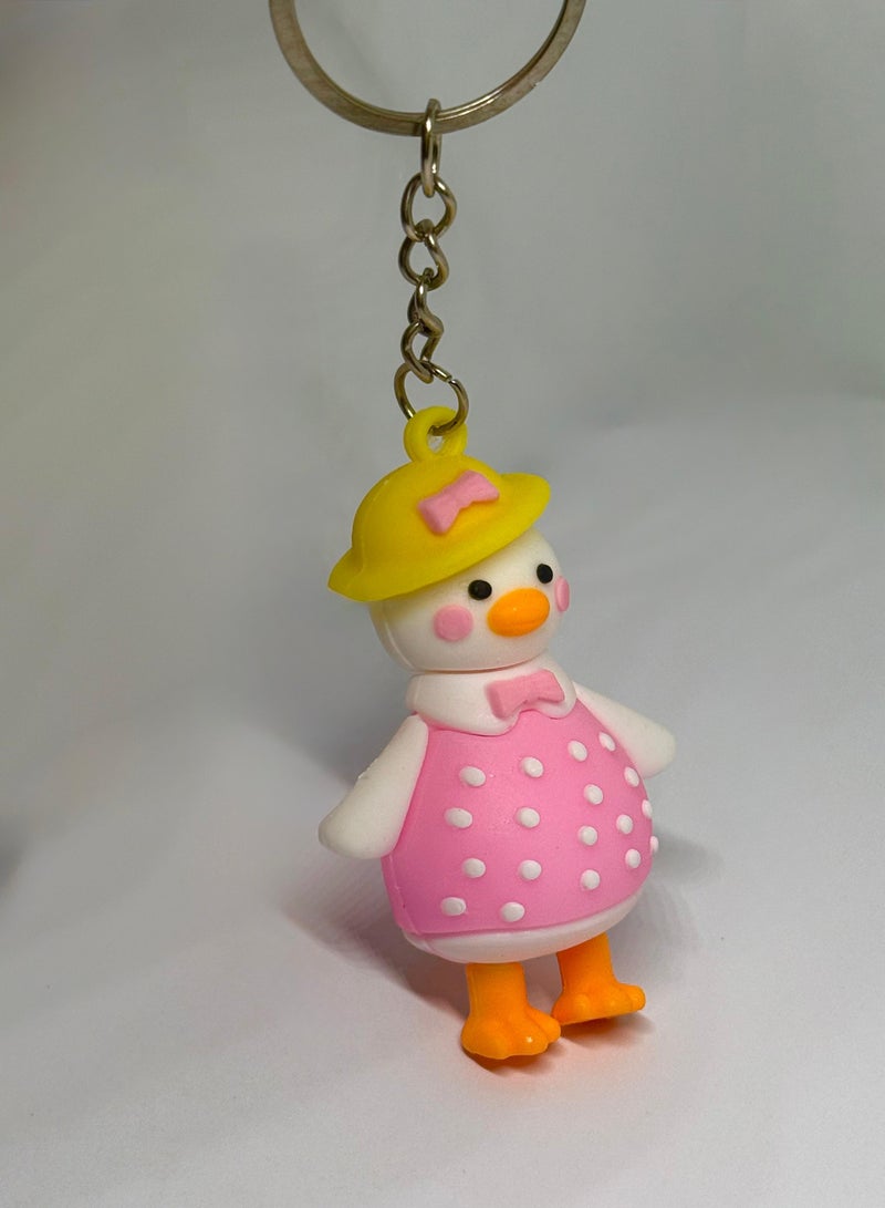 ميدالية مفاتيح كرتونية، ميدالية اطفال، ميدالية مضحكة طريفة، ميدالية للمفاتيح للبنات، تعليقة مفاتيح، تعليقة محفظة و شنطة ، مداليه تعليقه تتناسب مع الشنطة والمحفظة و سلسلة مفاتيح بشخصية كرتونية تناسب هدية لطيفة على شكل بطة بيضاء بلبس وردي جميل . - Image 1