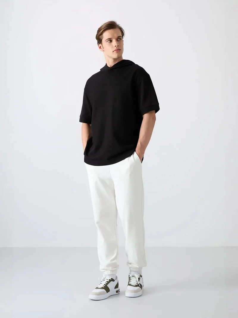 تومي لايف TOMMY Oversized Hooded Short-sleeve T-shirt