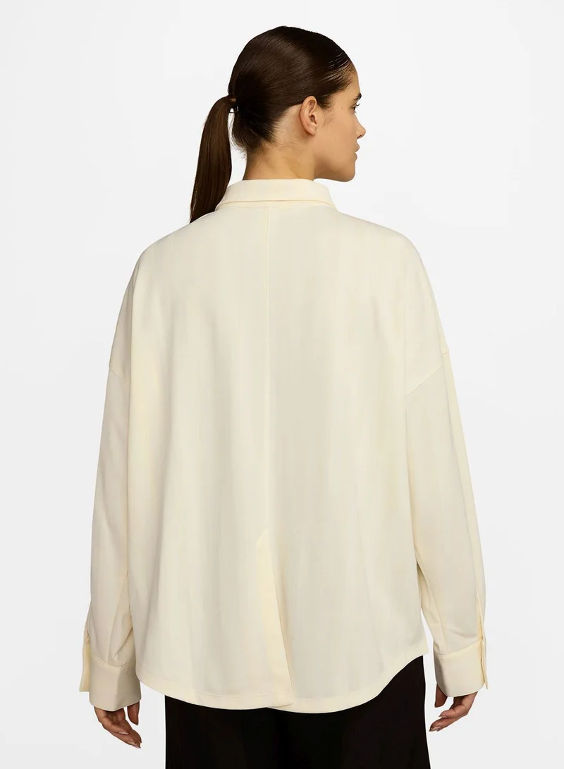 نايكي قميص بأزرار بنقش الجاكار المخطط