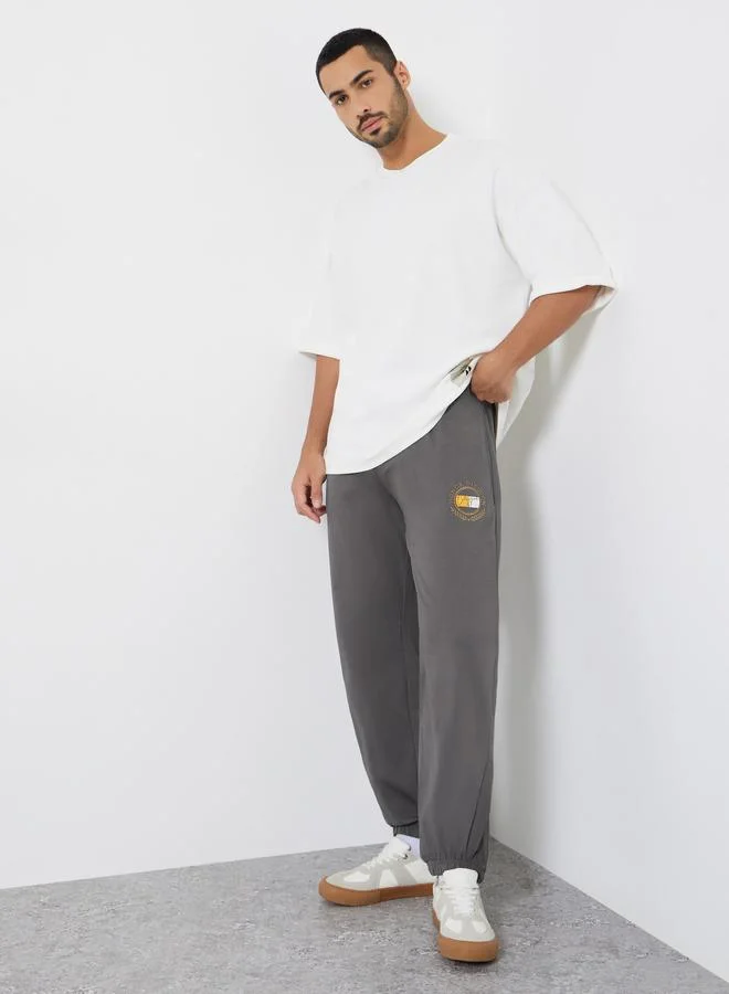 Styli Men Grey Embroidered Relaxed Fit Joggers