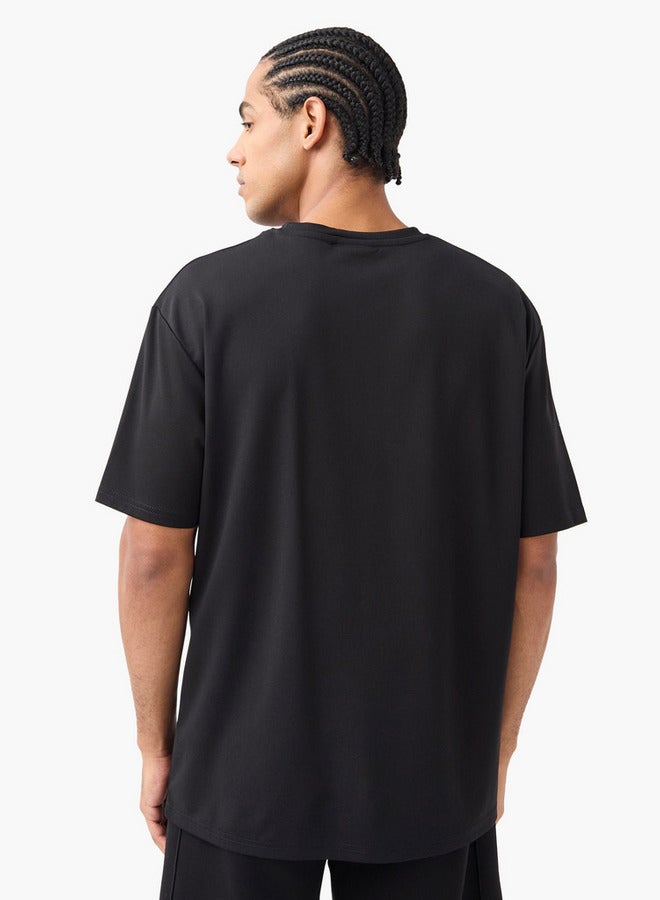 كابا تيشيرت بياقة ضيّقة وأكمام قصيرة وشعار من كابا - Image 3