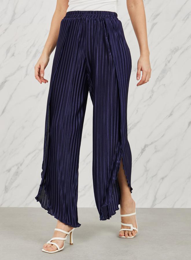 Styli Styli Plisse Asymmetric Hem Relaxed Pant - Image 1