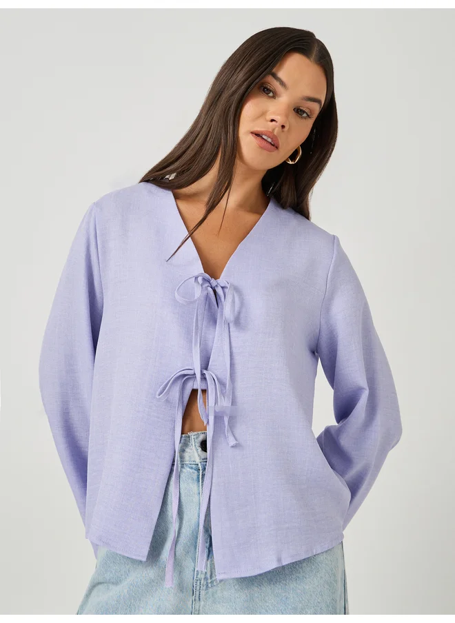 ستايلي Styli Plain V Neck Linen Look Top with Tie Detail