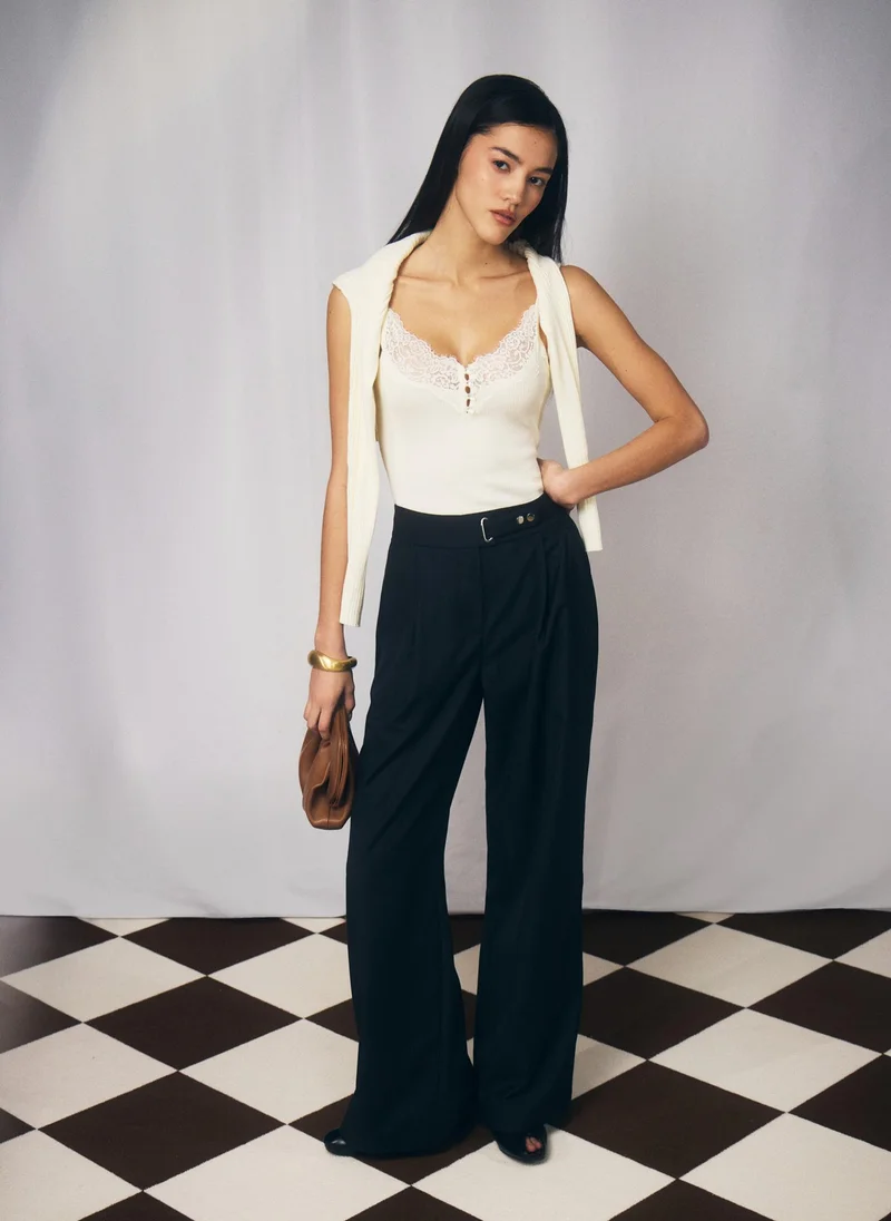 Lichi  Loose-fit trousers with asymmetrical fastening for Women | Best Price UAE