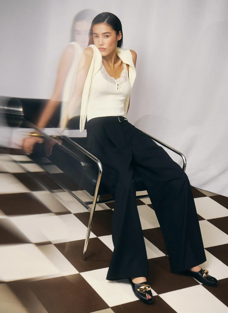 Lichi  Loose-fit trousers with asymmetrical fastening for Women | Best Price UAE