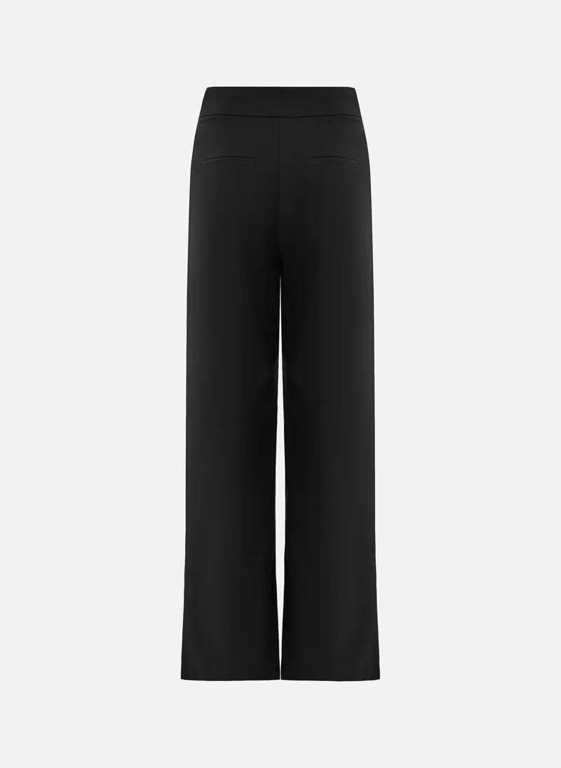 Lichi  Loose-fit trousers with asymmetrical fastening for Women | Best Price UAE