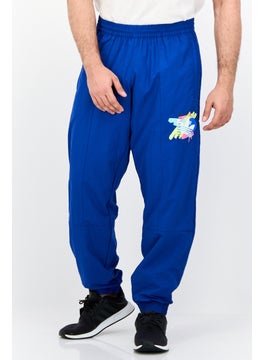 adidas Originals Men Sportswear Fit Printed Outdoor Track Pants, Royal Blue  - Image 1