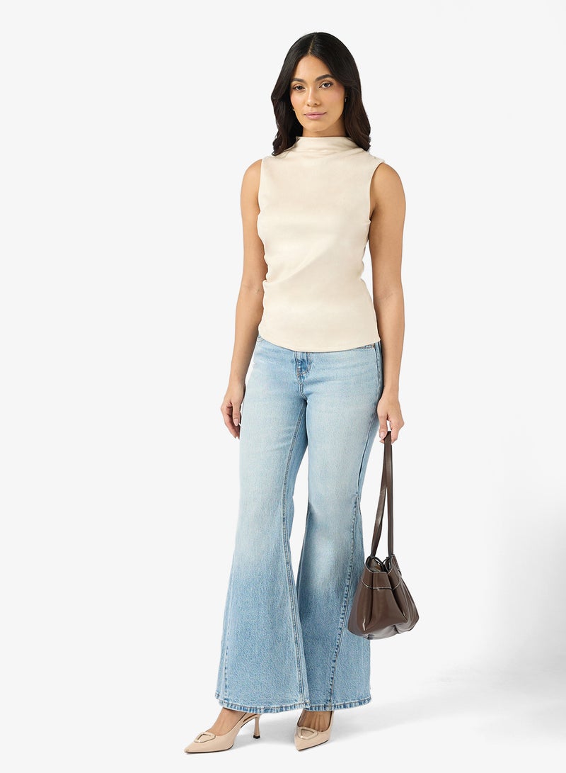 بلوزة بيلا قصيرة الأكمام من جلد الغزال الصناعي