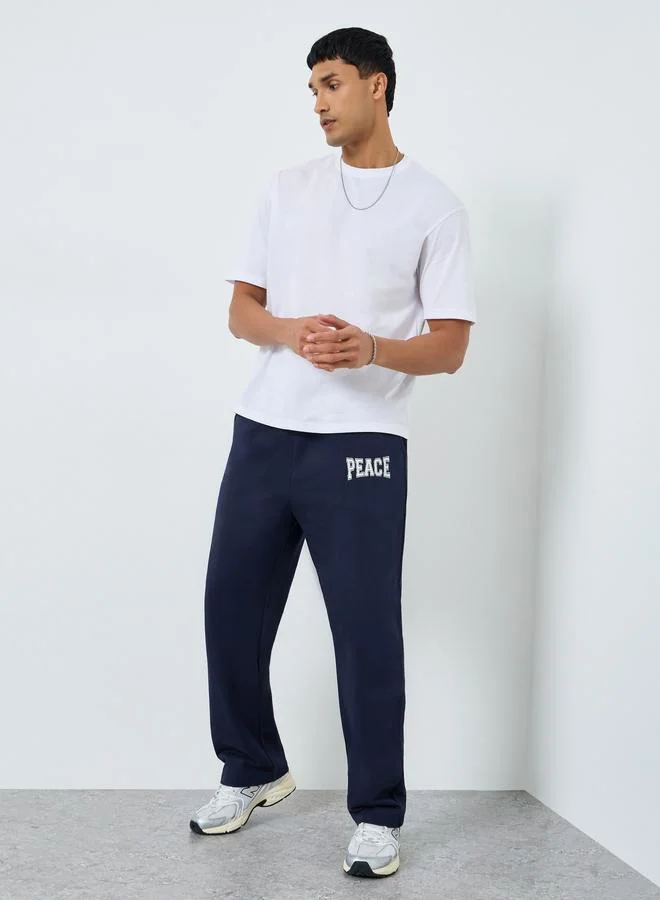 Styli Men Oversized Minimal Print Terry Joggers