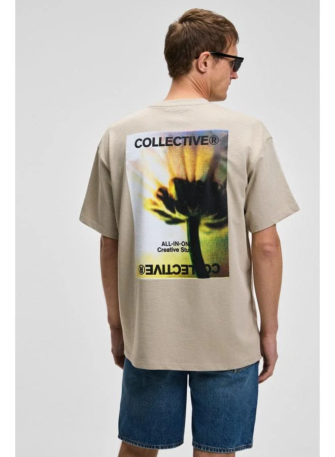 GRIMELANGE COLLECTIVE Men's Front Embroidery Back Print Detailed %100 Organic Cotton Oversized Short Sleeve Stone Color T-Shirt.