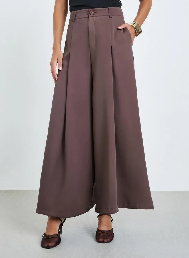 ستايلي بنطال منسدل بأرجل واسعة وكسرات