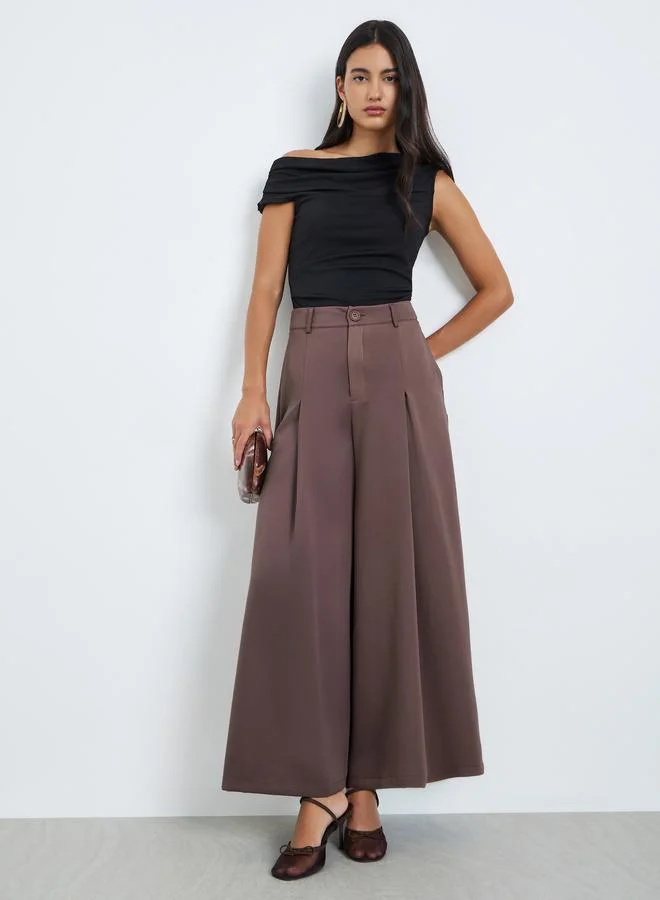 ستايلي بنطال منسدل بأرجل واسعة وكسرات