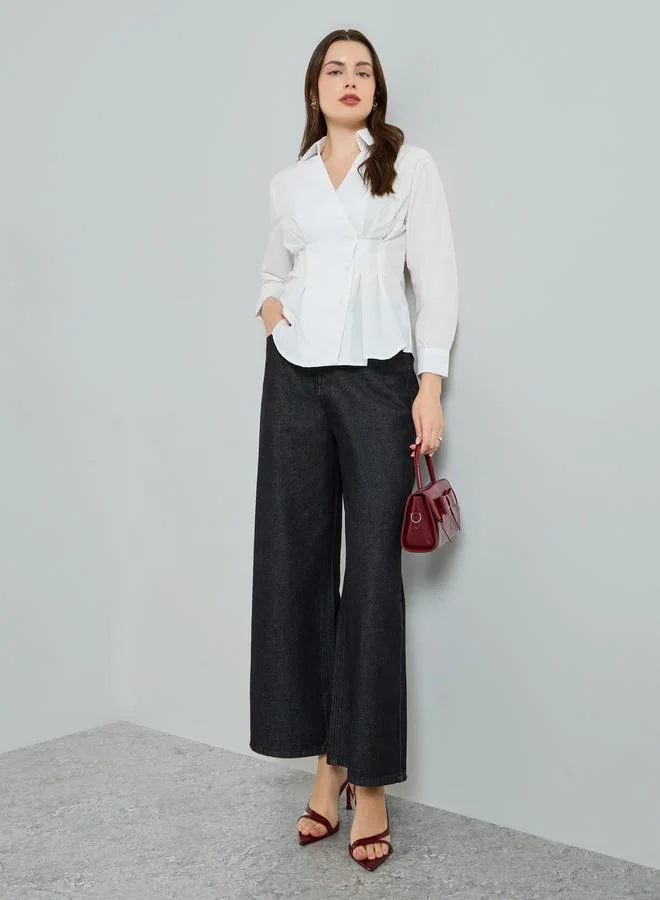 ستايلي بلوزة لف بأزرار لون أوف وايت