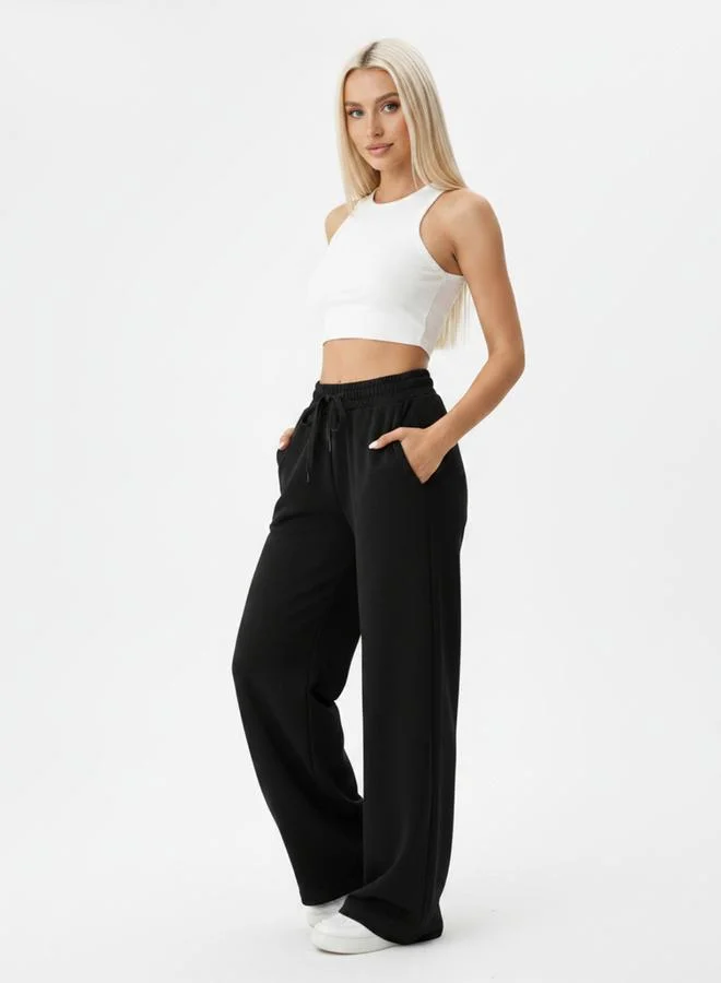 تايك تو Black Solid Wide Leg Joggers By Gravt