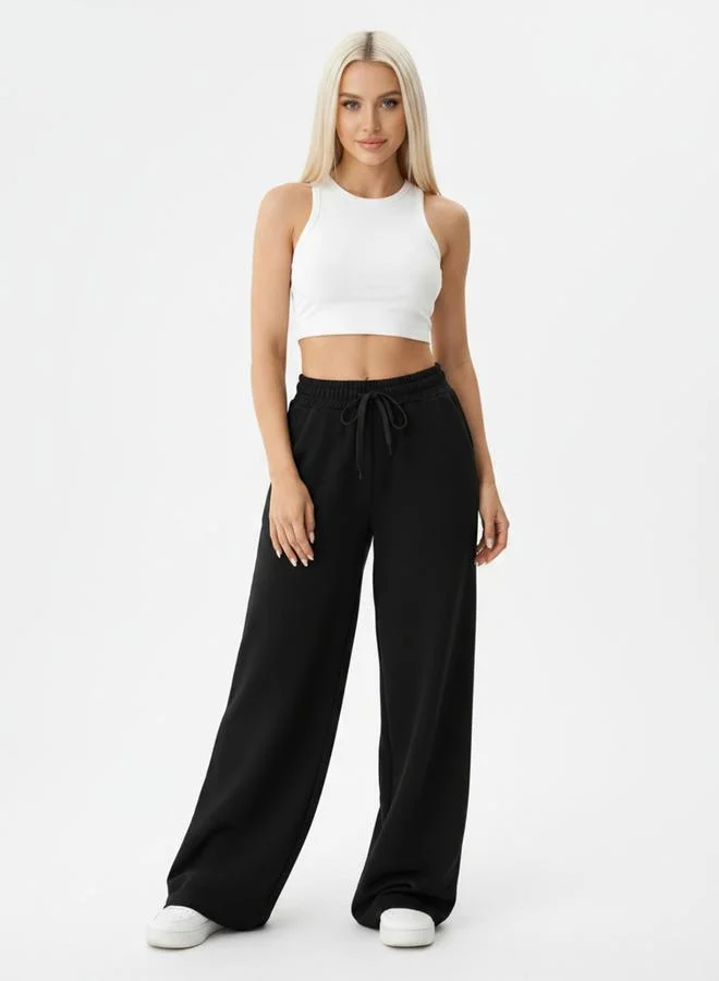 تايك تو Black Solid Wide Leg Joggers By Gravt
