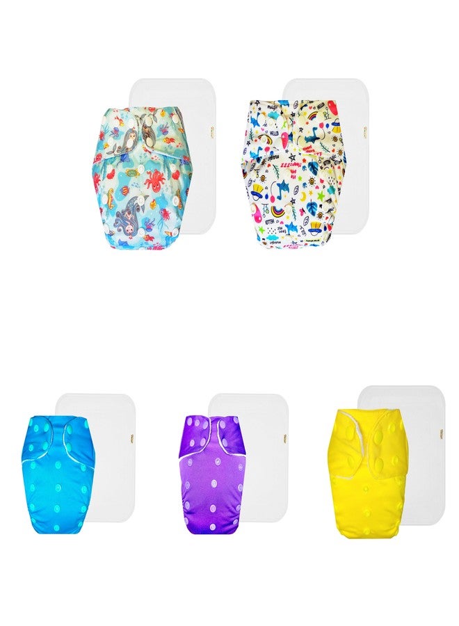 حفاضات دمبلدو القماشية الممتازة مع حشوة قطنية (عبوة من 5) | شعور بالجفاف والراحة | تهوية جيدة | أزرار كبس قابلة للتعديل | مثالية للأطفال الصغار | من 3 أشهر إلى 3 سنوات | للجنسين - Image 1