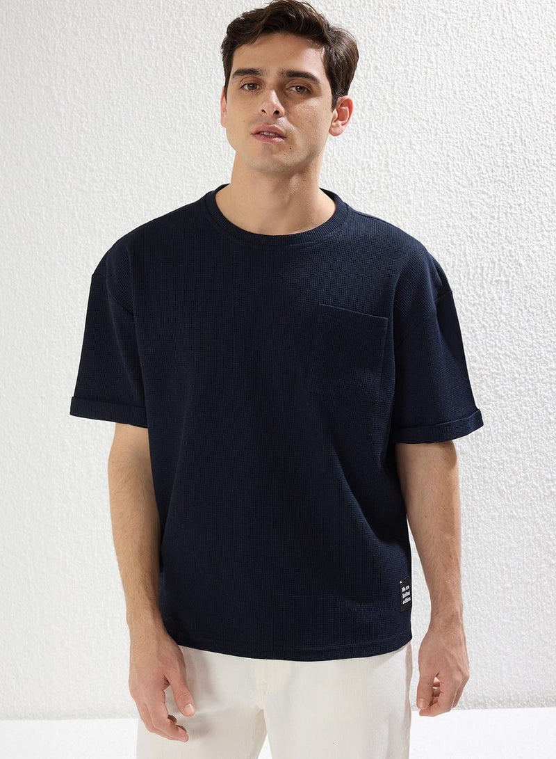 trendyol Basic Navy Blue Relaxed Textured Cut Waffles Pocket Labeled Short Sleeve T-shirt - Image 1