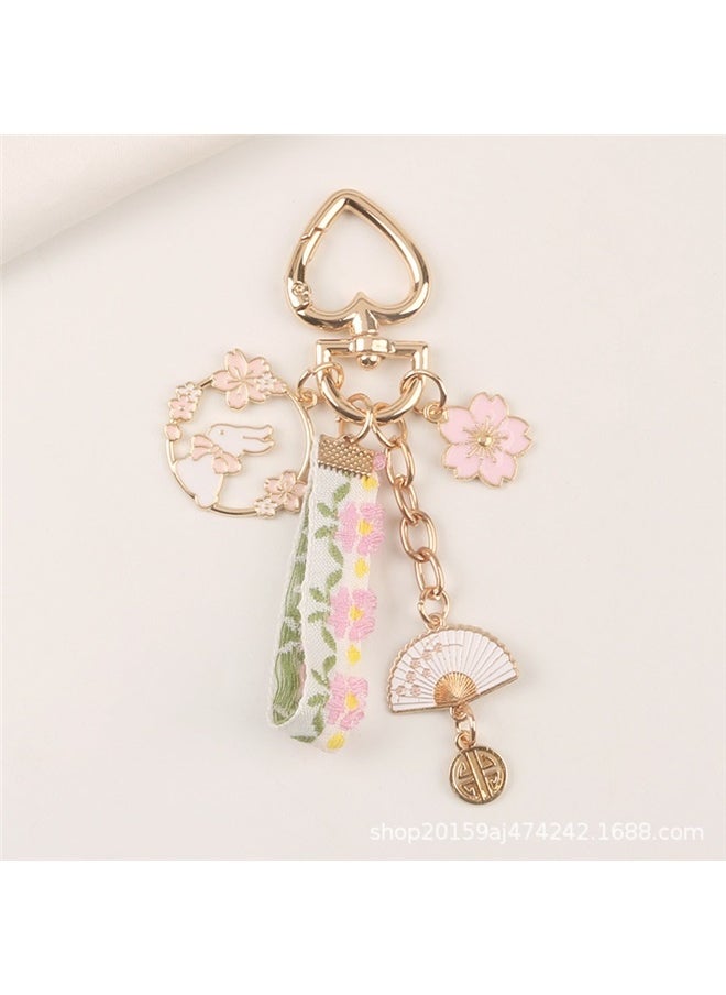 yongsheng Key Ring, Floral Keychain with Metal Charms, Fabric Accessory with Gold Details, Ideal for Keys, Bags, Camera and Phone Cases, Key Holder, Perfect for Travel, Friends Gifts  - Image 1