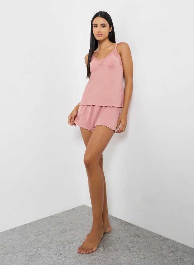 ستايلي طقم شورت وبلوزة كامي مضلعة بحواف مموجة