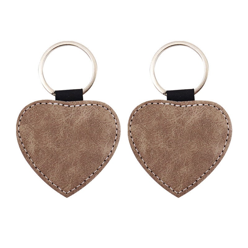 Heat Sublimation Color Pu Leather Double-Sided Blank Consumables Heat Transfer Heart-Shaped Litchi Pattern Keychain Source Manufacturers - Image 1