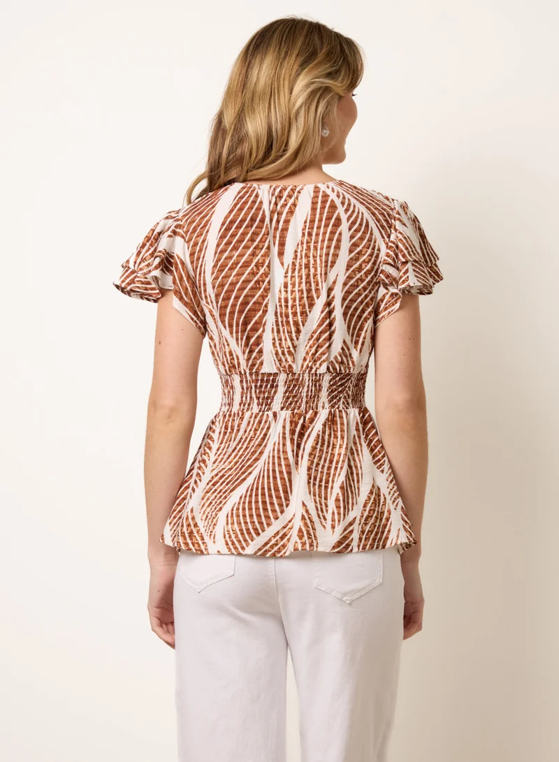 بلو فانيلا Printed Frill Peplum Top