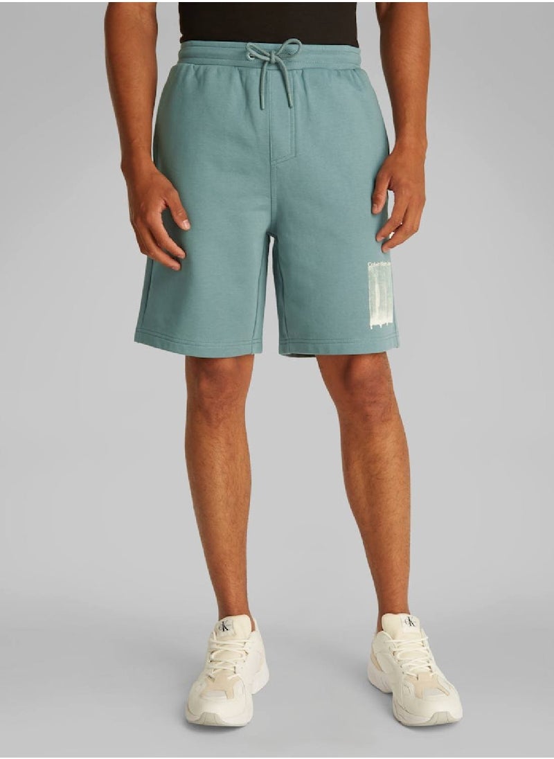 Calvin Klein Jeans Men's Graphic Sweatshorts - Cotton, Blue  - Image 1