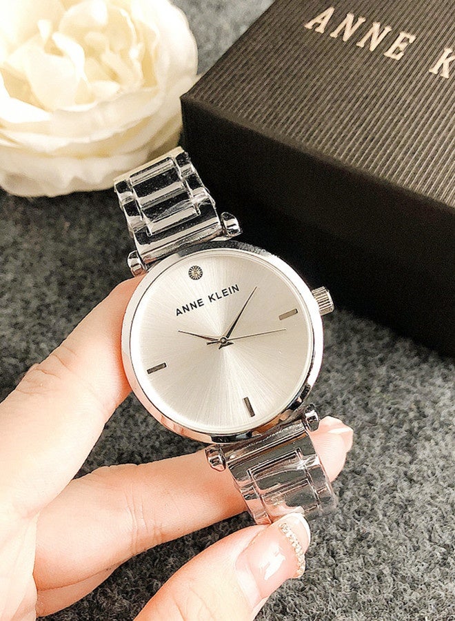 Anne Klein Women's Tonneau Simplicity silver Fashion Watch with silver Stainless Steel Strap