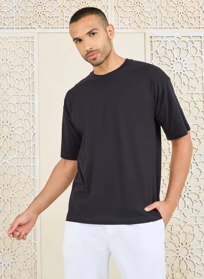 Styli Oversized Star Slogan Back Print Compact Jersey T-shirt