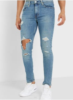 Distressed Mid Wash Skinny Jeans