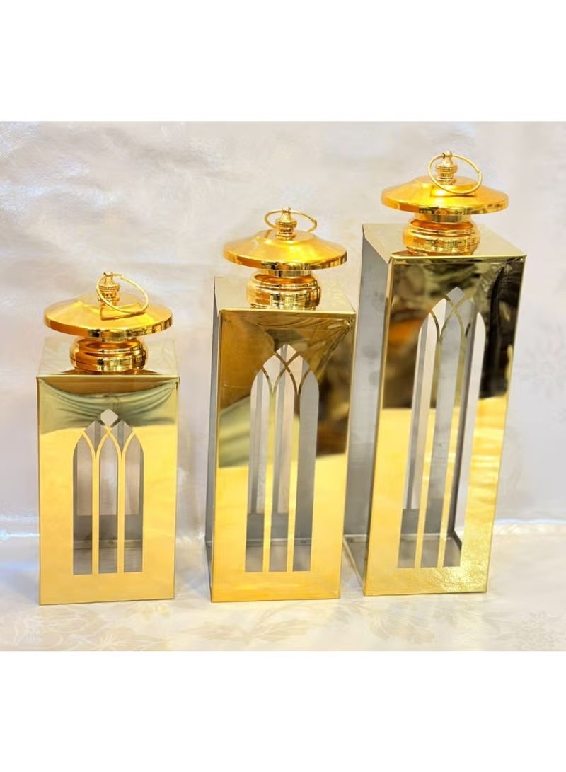 Ramadan Lanterns Gold Color Stainless Different Sizes Very Elegant Ramadan Decor Set of 3 Ajam 25,30,35 cm with 3 Gold Decorative Wax - Image 1