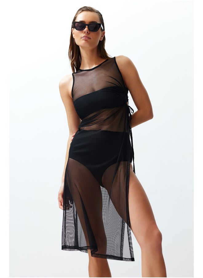 trendyol - فستان شاطئ ماكسي محبوك بفتحات/شبكة باللون الأسود TBESS24EL00077 - Image 1