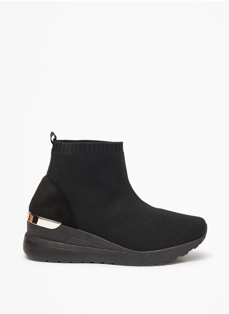 فلورا بيلا من شو إكسبرس Womens Textured Slip-On Ankle Boots with Pull Tabs