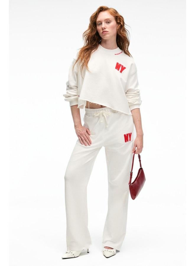GRIMELANGE AVENZA Women's embroidered-detail side pocket regular wide-leg beige sweatpants. - Image 1