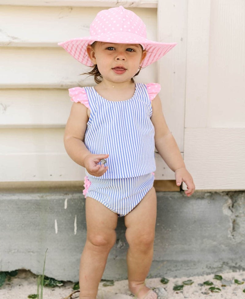 RuffleButts® Baby/Toddler Girls Pink Polka Dot and Pink Stripe Reversible Swim Hat - 12m-2T - Image 2