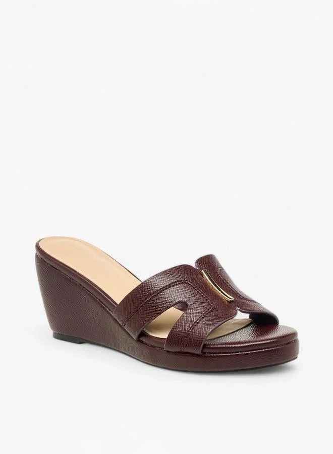 فلورا بيلا من شو إكسبرس صنادل نسائية بكعب إسفيني مزخرف