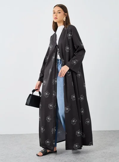 ستايلي عباية نسائية سوداء بربطة أمامية وطبعات زهور شاملة