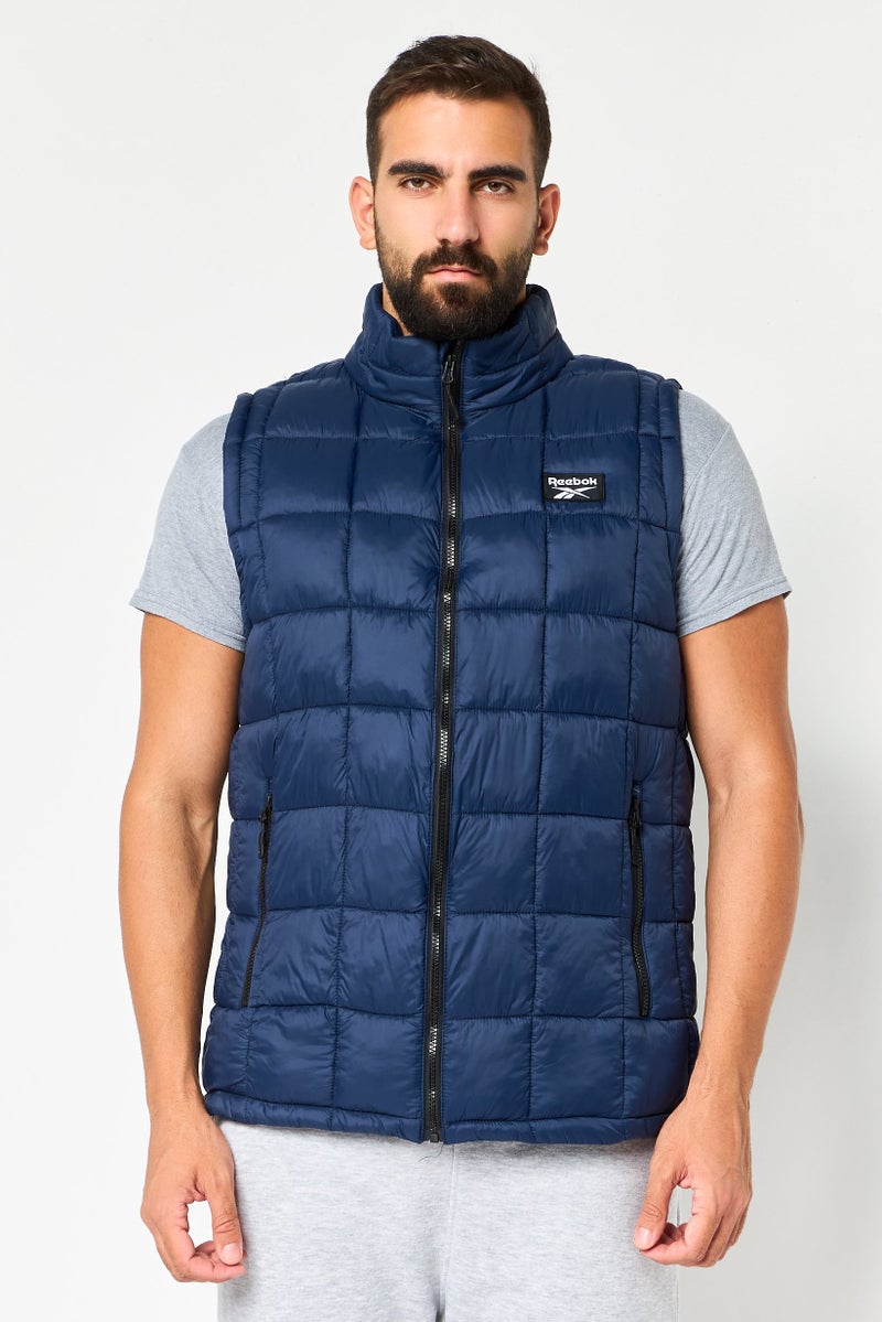 Reebok Men Sportswear Fit Sleeveless Outdoor Puffer vest Jacket, Navy Blue - Image 1