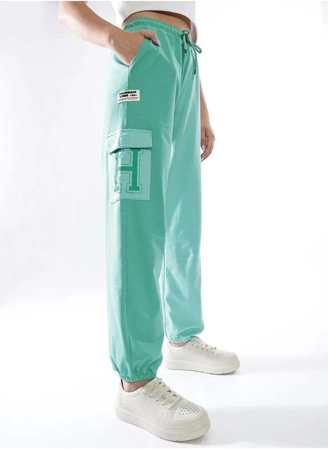هوبرهولمي Women Track Pants in Multicolor featuring Jogger fit with a colourblocked pattern, no sleeves, regular length, secured with elasicated + drawstring closure, crafted from terry – perfect for elevating your everyday style.