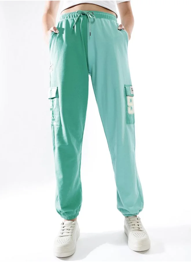 هوبرهولمي Women Track Pants in Multicolor featuring Jogger fit with a colourblocked pattern, no sleeves, regular length, secured with elasicated + drawstring closure, crafted from terry – perfect for elevating your everyday style.